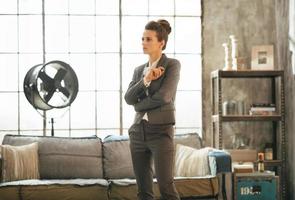 thoughtful business woman in loft apartment photo