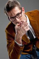 Young interesting businessman with rimmed glasses photo