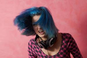 Punk girl DJ with dyed turqouise hair