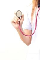 Closeup of medical doctor holding stethoscope