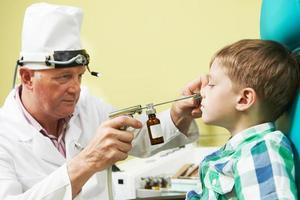 Little boy at ear nose thoat doctor