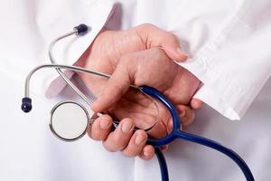 Stethoscope in hands photo