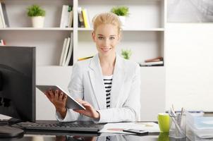 Businesswoman working at office photo