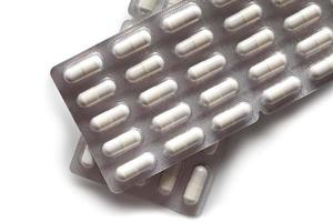 medicamento - cápsulas blancas foto
