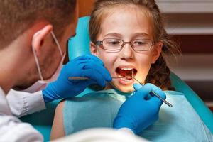 Examination by dentist photo