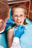 Examination by dentist photo