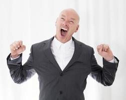 man in a suit yawning