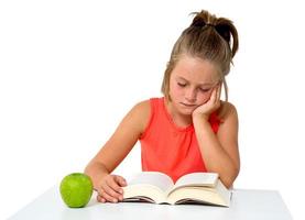 little girl reading a book photo