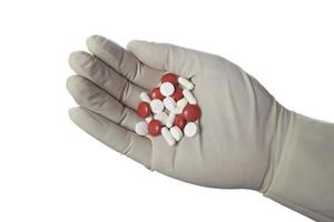 pills tablets medicine healthcare hand glove photo