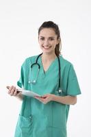 Portrait of healthcare worker wearing uniform and stethoscope. photo