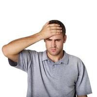 sick man touching his head with a hand