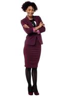 Confident corporate woman with folded arms photo