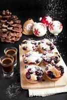 christmas breakfast muffins with grapes & coffee espresso. photo