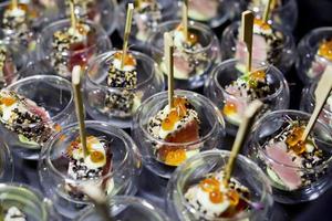Finger Food in small glass with stick photo