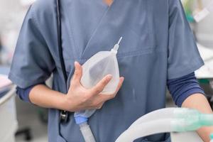 anesthesiologist use ambu bag for oxygenation photo