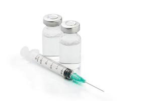 Medical ampules and syringe isolated photo
