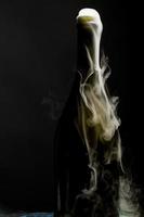 Champagne bottle with smoke