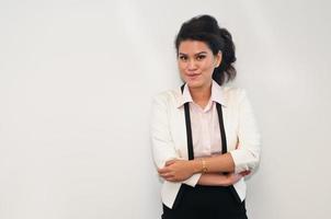 Business woman is smiling and standing photo