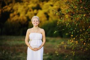 Young  caucasian pregnant woman photo
