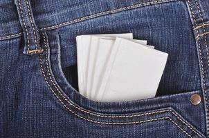 Paper handkerchief in the jeans pocket photo