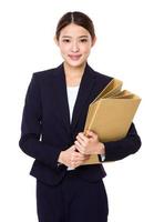 Businesswoman hold with folder