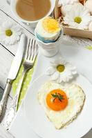 Easter table setting with flowers and eggs