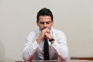 Young Businessman Having Stress In The Office photo
