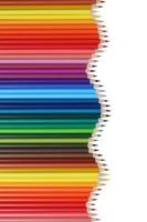 School supplies colored pencils forming a wave, education topic photo