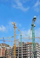 Crane and construction site photo