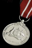 la medalla de defensa australiana en negro foto