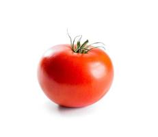 tomate rojo fresco con tallo verde foto