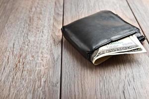Wallet  on wooden table photo