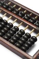 old abacus ancient classic close up isolated on white background photo