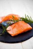 Portions of Fresh Salmon Fillets with Aromatic Herbs and Spices photo