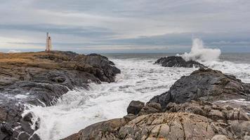 Crashing waves in Vatnajokull National Park in Iceland photo