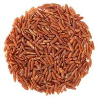 Red raw rice in round shape, isolated photo