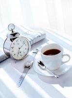 alarm clock and coffee