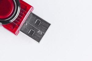 Red USB Flash Drive on White Background photo