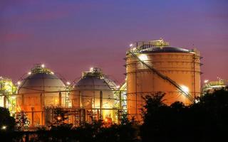 Chemical industrial storage sphere tanks at twilight time photo