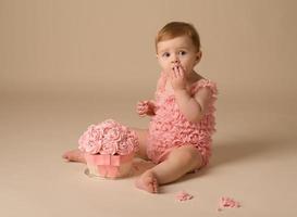 Baby Girl Tasting Cake photo