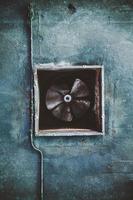 Abandoned air conditioning duct and rusted fan