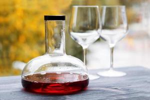wine decanter and empty glasses