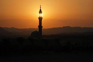 mosque in egypt at sunset photo