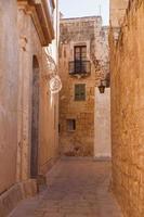 Ancient narrow street in Mdina, Malta. photo