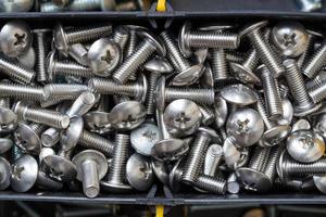 close up of stainless bolts in the tool box photo