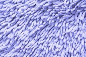 Closeup Texture of Fluffy Purple Microfiber Carpet
