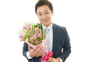 Man holding flower bouquet