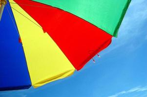 colorful umbrella tent with blue sky background photo