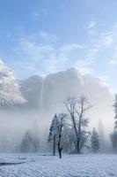 Upper Yosemite Falls with mist and snow
