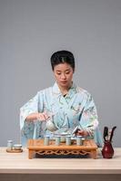 Asian beauty getting ready for tea ceremony